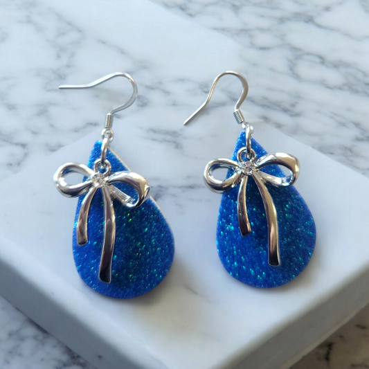 Glitter teardrops with white alloy accented bow