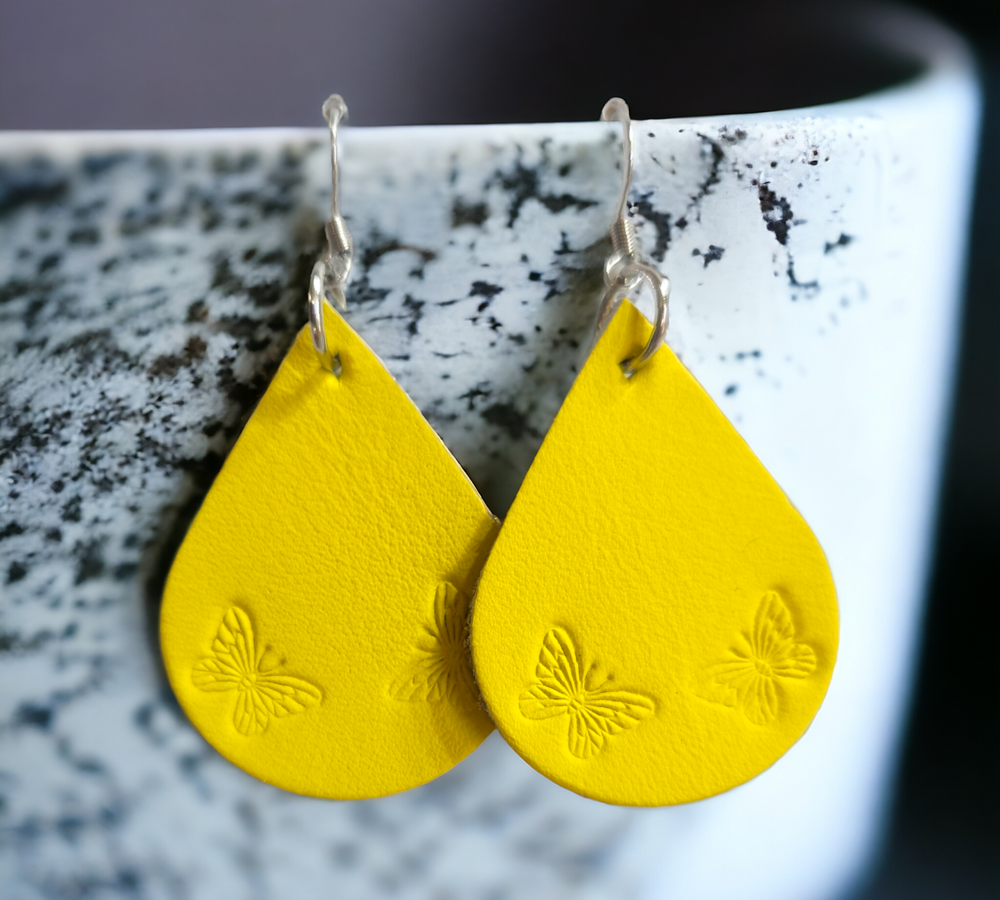 Butterfly stamped teardrop earrings