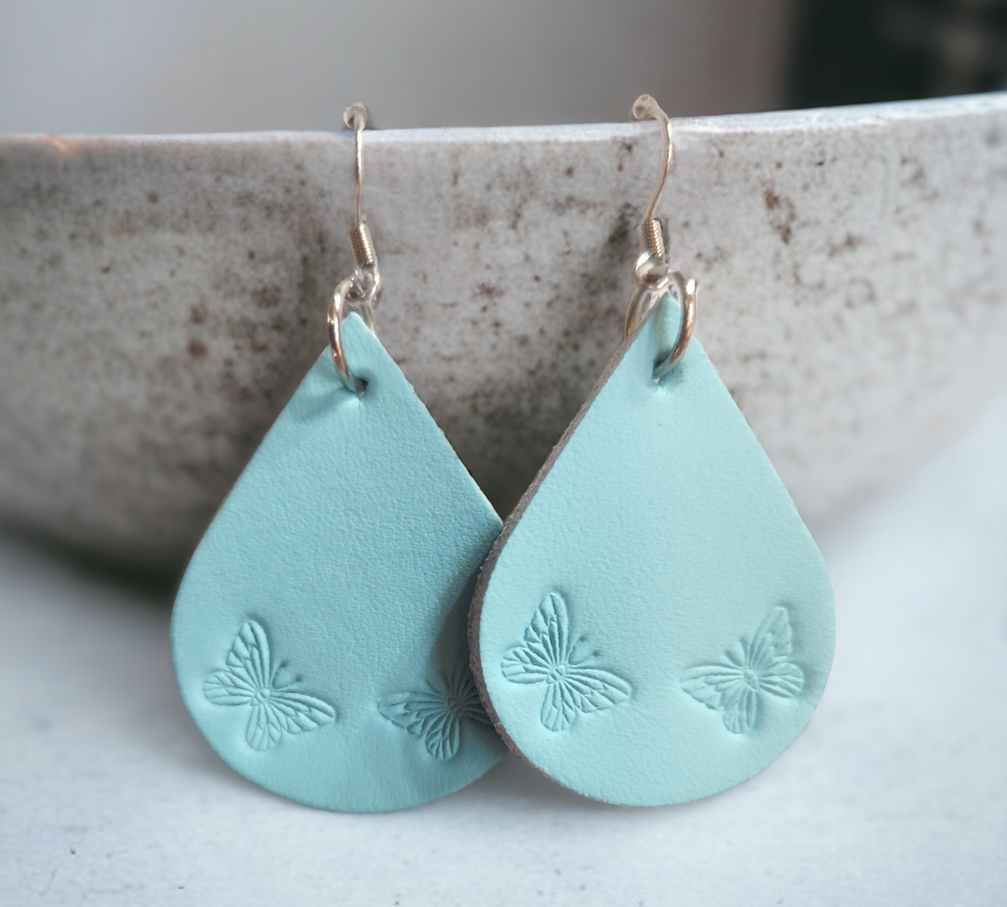 Butterfly stamped teardrop earrings