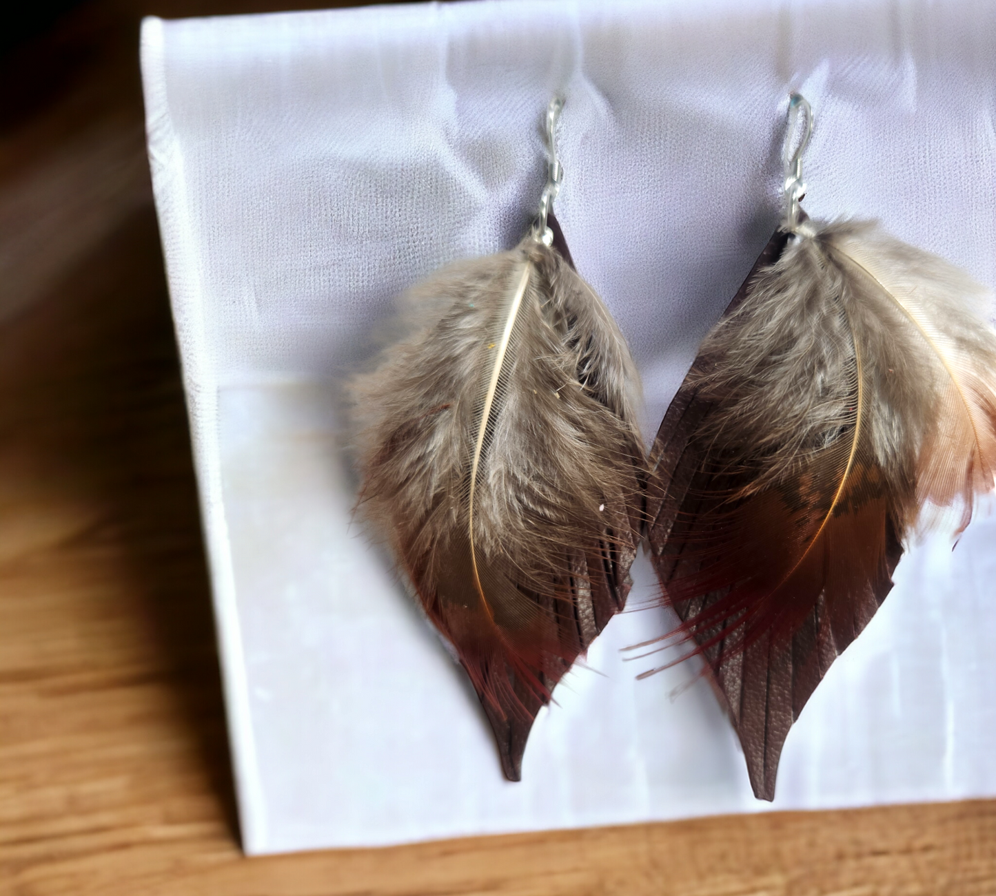 Dark Brown Gladys accented with Grey and Red Feathers