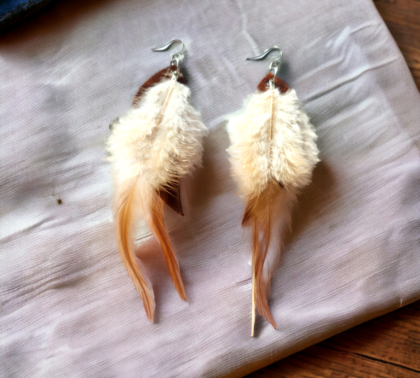 Rust colored suede feather accented with genuine brown feathers