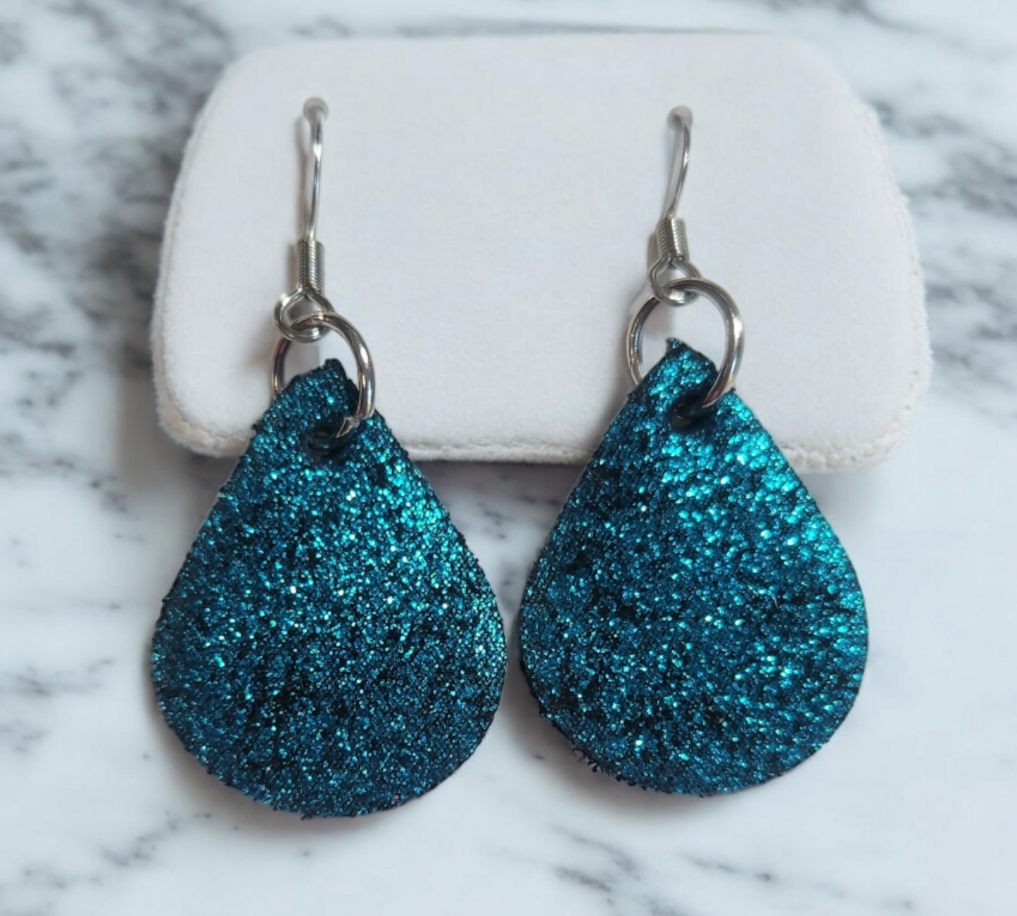 Sparkly teal blue teardrops