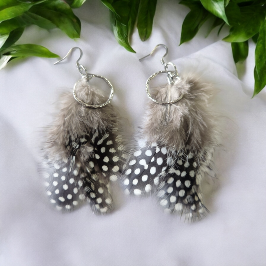 Black and white spotted feathers with accent hoop