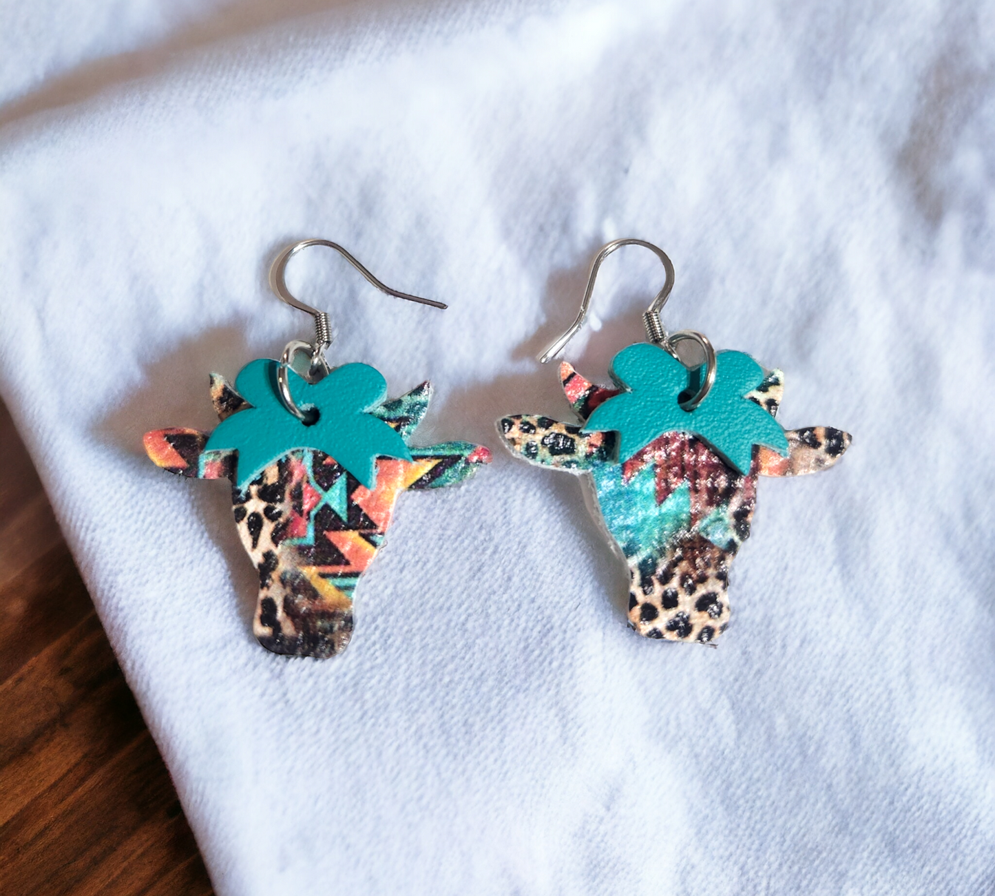 Boho cows with Teal Bows